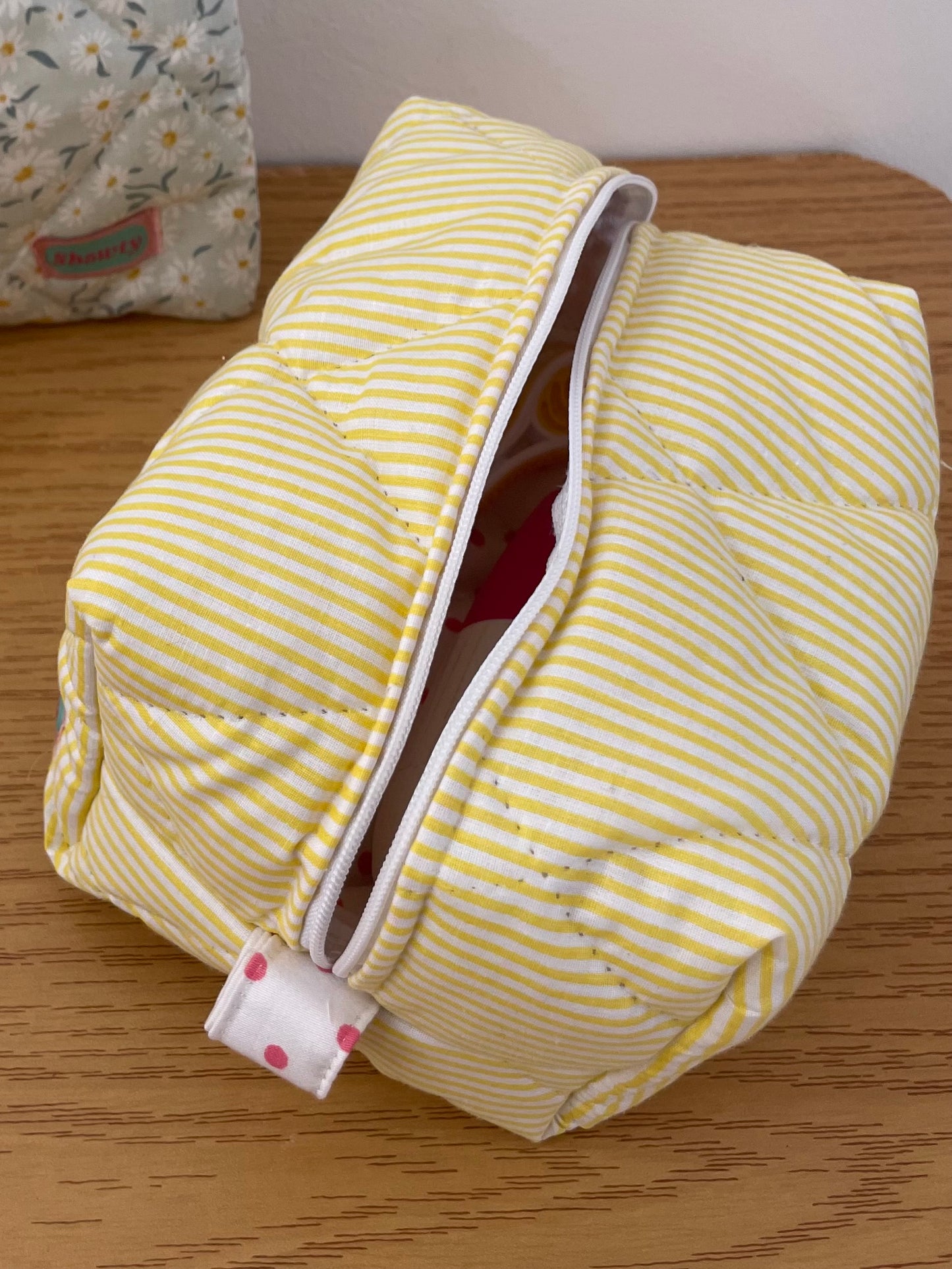 Yellow stripped pouch